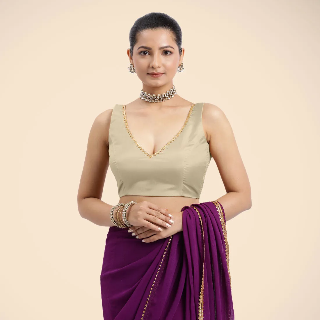 Raisa x Tyohaar | Cream Sleeveless FlexiFit™ Saree Blouse with V Neckline with Golden Gota Lace Embellishment and Back Cut-out with Tie-Up